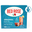 Box of Red Rose Original Black Tea with a Mystery Figurine on a white background