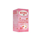 Pink box of Red Rose Strawberry Cheesecake herbal tea on a white background