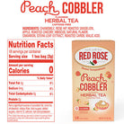 Red Rose Peach Cobbler Herbal Tea packaging with nutrition facts on a white background