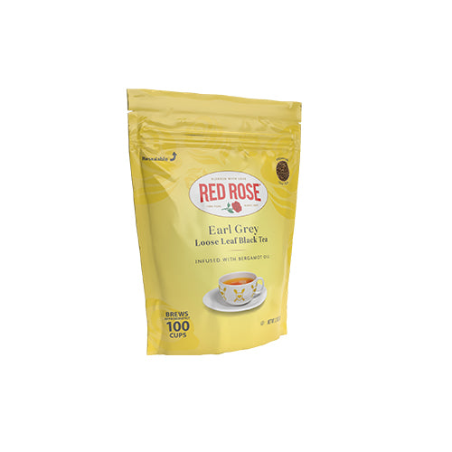 Yellow package of Red Rose Earl Grey tea on a white background