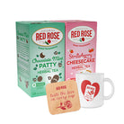 Red Rose Chocolate Mint Patty and Strawberry Cheesecake herbal tea boxes, mug, and coaster on a white background